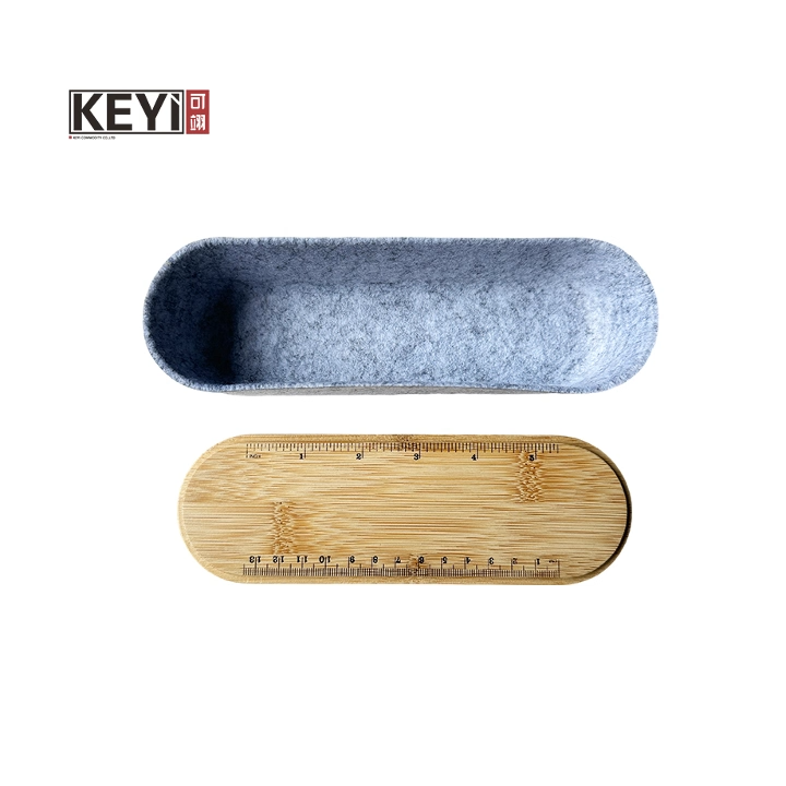 Felt pen holder with bamboo cover and elastic band. With ruler and integration