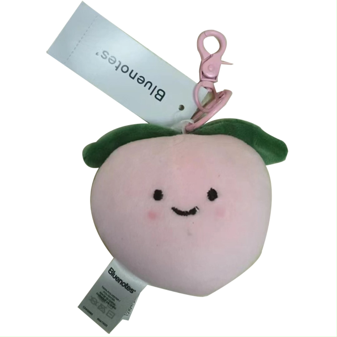 Sell like hot cakes durable Hot peach shaped 94.6% polyester 5.4% spandex woven plush key chain